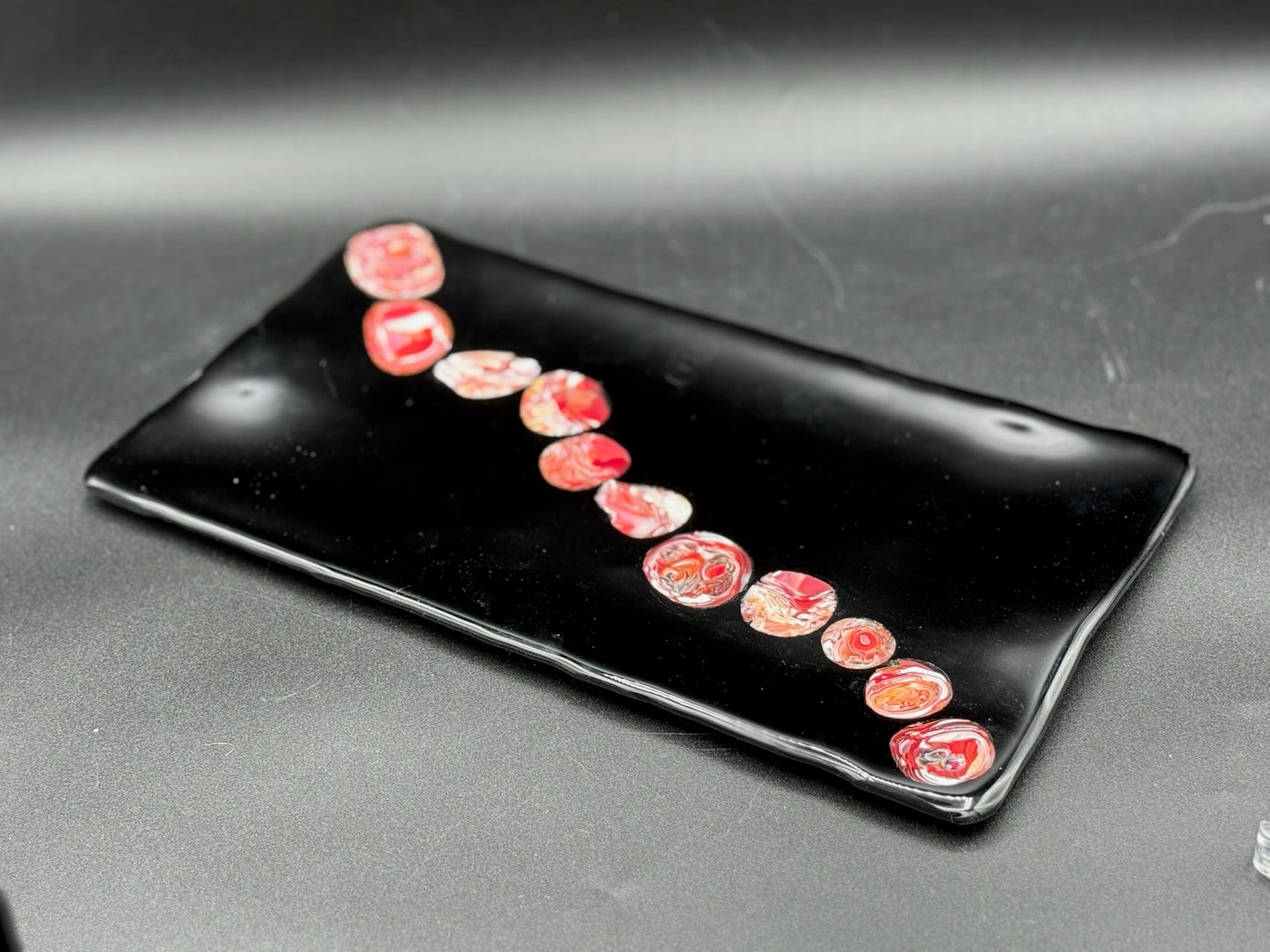Black, red and white tray