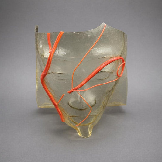 Sculpted Face with Red Lines