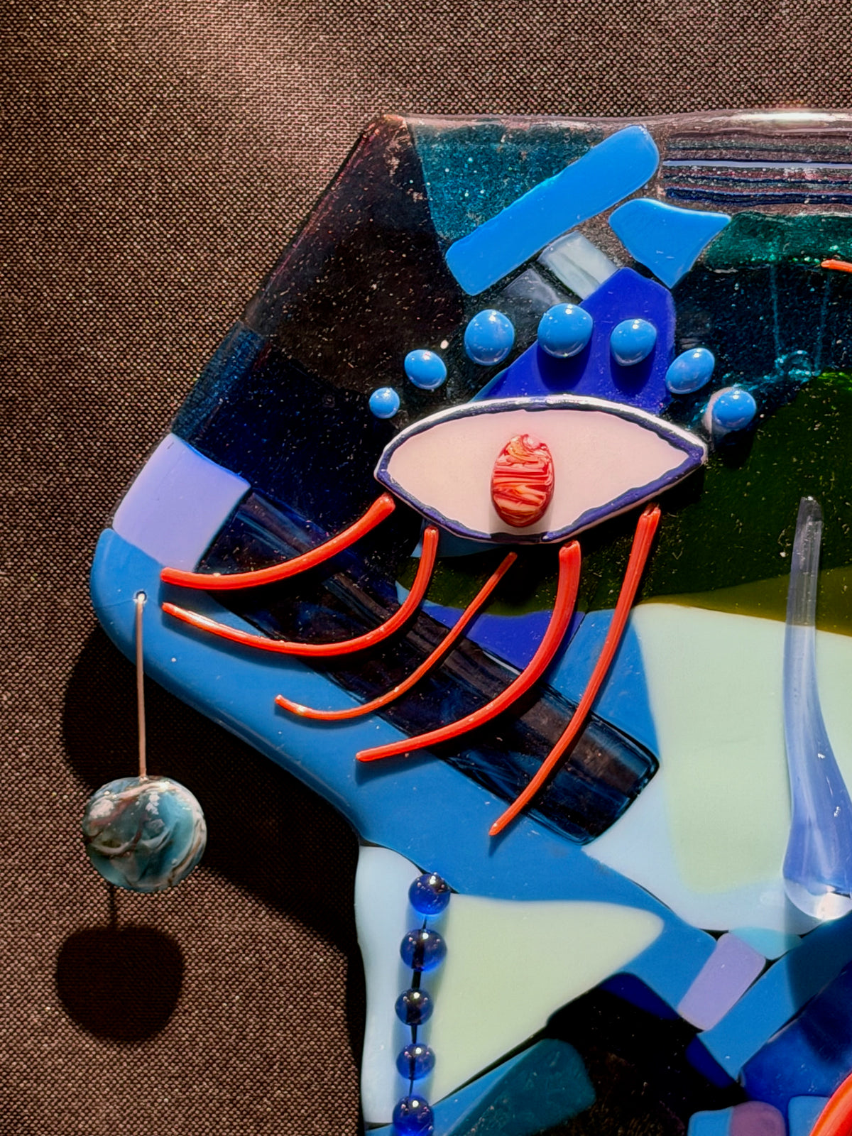 Detail view of The Blue Muse, handmade fused glass by Paige's Glass Art.