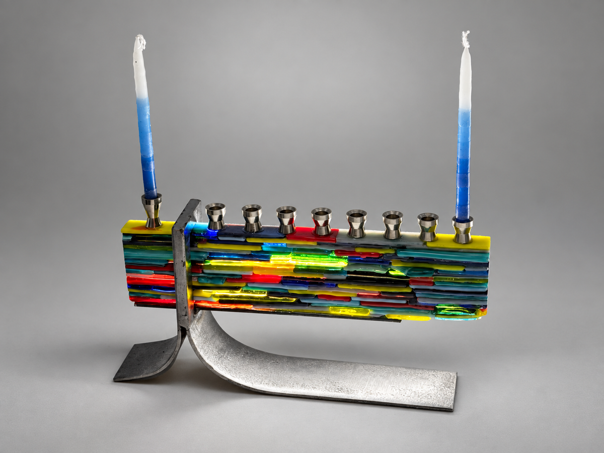 Cantilevered Menorah in fused glass and steel by Paige's Glass Art.